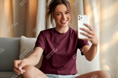 Woman taking selfie on sofa phone casual Product Image 1