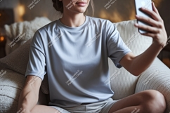 Woman taking selfie wearing grey t shirt phone Product Image 1