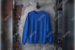 Blue Tshirt Mockup Hanging On Concrete Wall Product Image 1