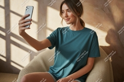 Woman taking selfie with phone casual home Product Image 1
