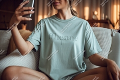 Woman wearing t shirt taking selfie phone Product Image 1