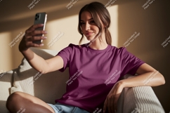 Woman taking selfie in purple shirt phone Product Image 1