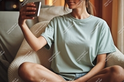 Woman taking selfie on couch phone casual Product Image 1