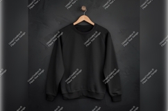 Black Tshirt Mockup Hanging On Dark Wall Product Image 1