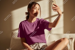 Woman taking selfie wearing purple t shirt phone Product Image 1