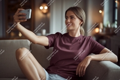 Young woman taking selfie on couch phone home Product Image 1