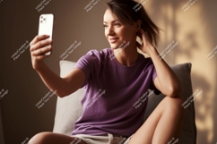 Woman taking selfie with phone casual home Product Image 1