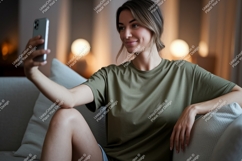 Woman taking selfie on couch phone home Product Image 1