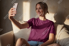 Woman taking selfie wearing plum t shirt phone Product Image 1
