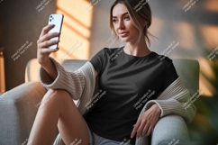 Woman taking selfie wearing black t shirt Product Image 1