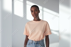 Woman Wearing Peach Tshirt Mockup Studio Shot Product Image 1