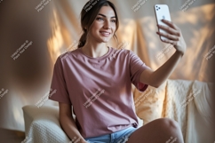 Woman taking selfie wearing pink shirt phone Product Image 1