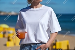 Woman white t shirt holding drink t-shirt beach Product Image 1