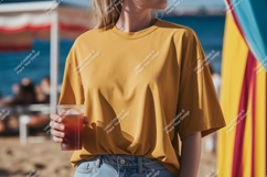 Mustard yellow t shirt holding drink image Product Image 1