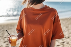 Orange shirt beverage beach sand Product Image 1
