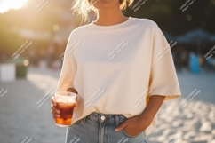 Woman holding drink on beach summer casual Product Image 1