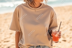 Person wearing beige t shirt holding pink drink image Product Image 1