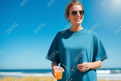 Woman blue shirt sunglasses beach drink image Product Image 1