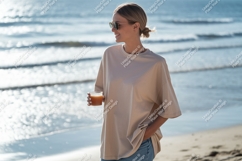 Woman holding drink on sandy beach ocean beverage Product Image 1