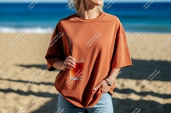 Woman holding drink on sandy beach ocean Product Image 1