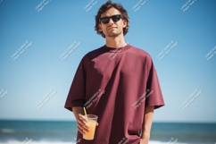 Man wearing maroon t shirt holding drink sunglasses Product Image 1
