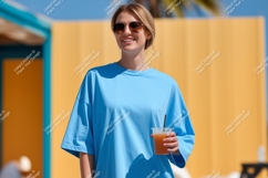 Blue shirt woman holding drink sunglasses Product Image 1