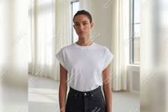Woman Wearing White Tshirt Mockup In Studio Product Image 1