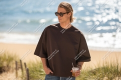 Man wearing brown t shirt and sunglasses t-shirt beach Product Image 1