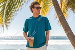 Man wearing teal shirt holding iced coffee image Product Image 1