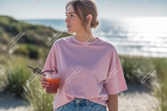 Woman pink shirt holding drink sunglasses beach image Product Image 1