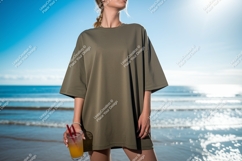Woman wearing olive green t shirt holding drink image Product Image 1