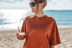 Woman holding drink on beach ocean sunglasses Product Image 1