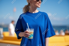 Blue shirt woman holding drink beverage Product Image 1