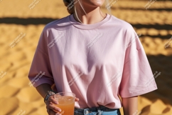 Pink shirt beverage outdoors sand Product Image 1