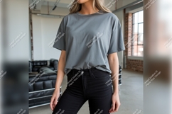 Woman Wearing Grey Tshirt Mockup And Jeans Product Image 1
