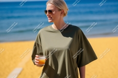 Woman wearing olive green t shirt on beach image Product Image 1