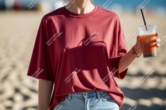 Crimson shirt light jeans holding drink image Product Image 1