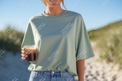 Person holding beverage wearing casual shirt outdoor Product Image 1