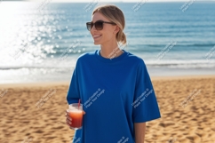Woman holding drink on beach ocean sunglasses Product Image 1