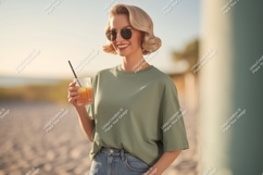 Woman holding drink on beach sunglasses Product Image 1