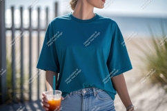 Teal t shirt denim jeans beach drink image Product Image 1