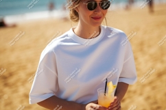 Woman wearing white shirt holding drink on beach sunglasses Product Image 1