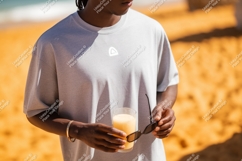 Man holding drink sunglasses beach summer Product Image 1