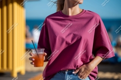 Woman wearing pink t shirt holding drink image Product Image 1