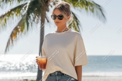 Woman holding drink on beach ocean palm Product Image 1