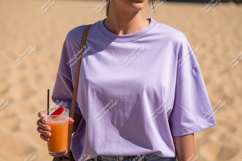 Woman wearing lavender t shirt holding drink image Product Image 1