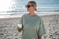 Woman holding green drink on beach sunglasses Product Image 1