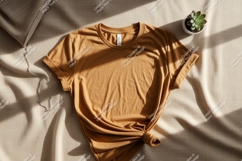 Amber tee draped on textured fabric t-shirt knot Product Image 1