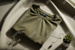Olive green t shirt and jewelry folded Product Image 1