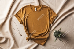 Mustard yellow t shirt mockup with necklace and plant Product Image 1